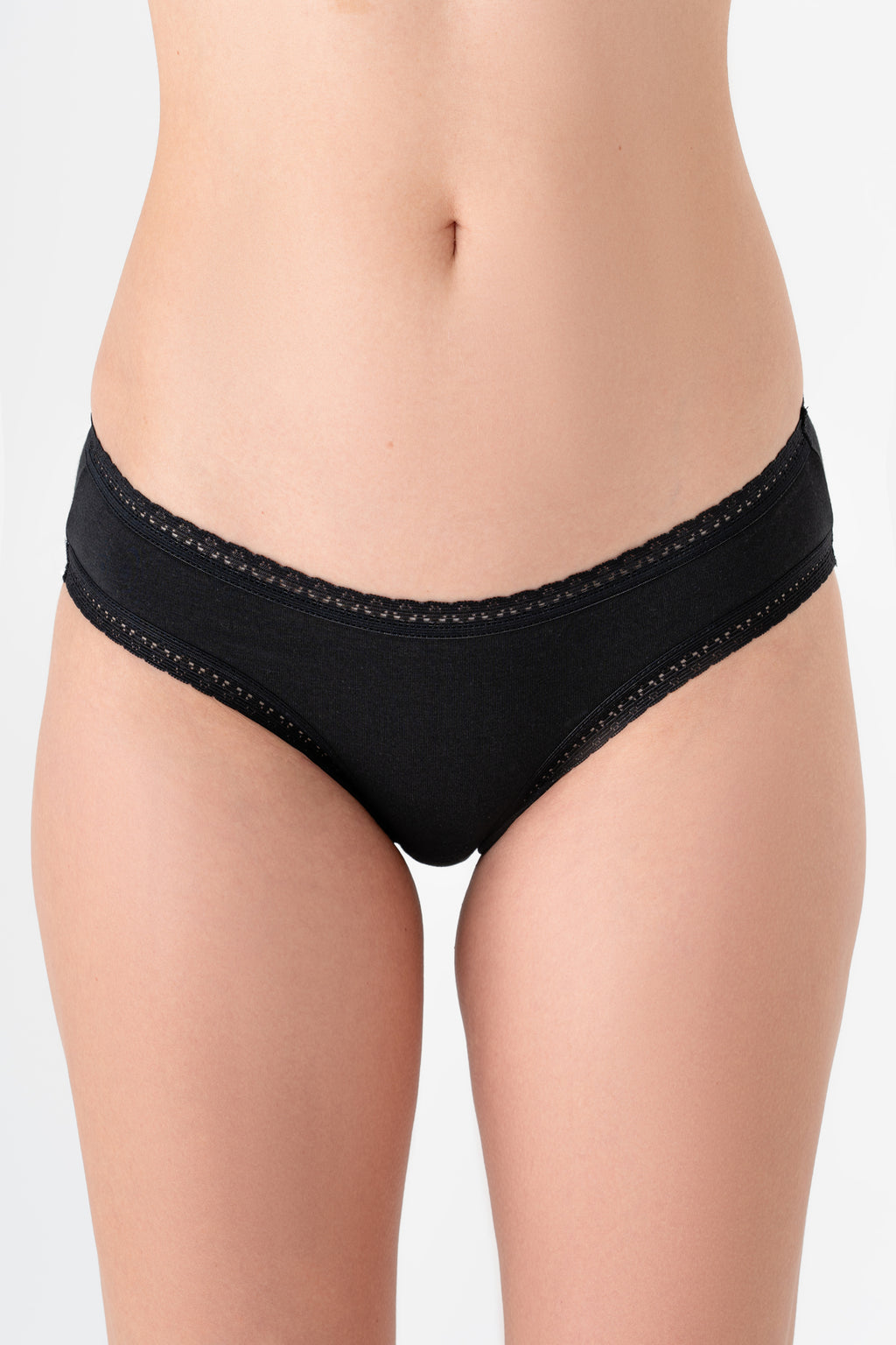 Women's organic cotton lace briefs in black, front view on model