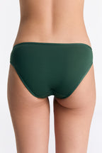 Women's classic organic cotton briefs in Dark Green, back view on model