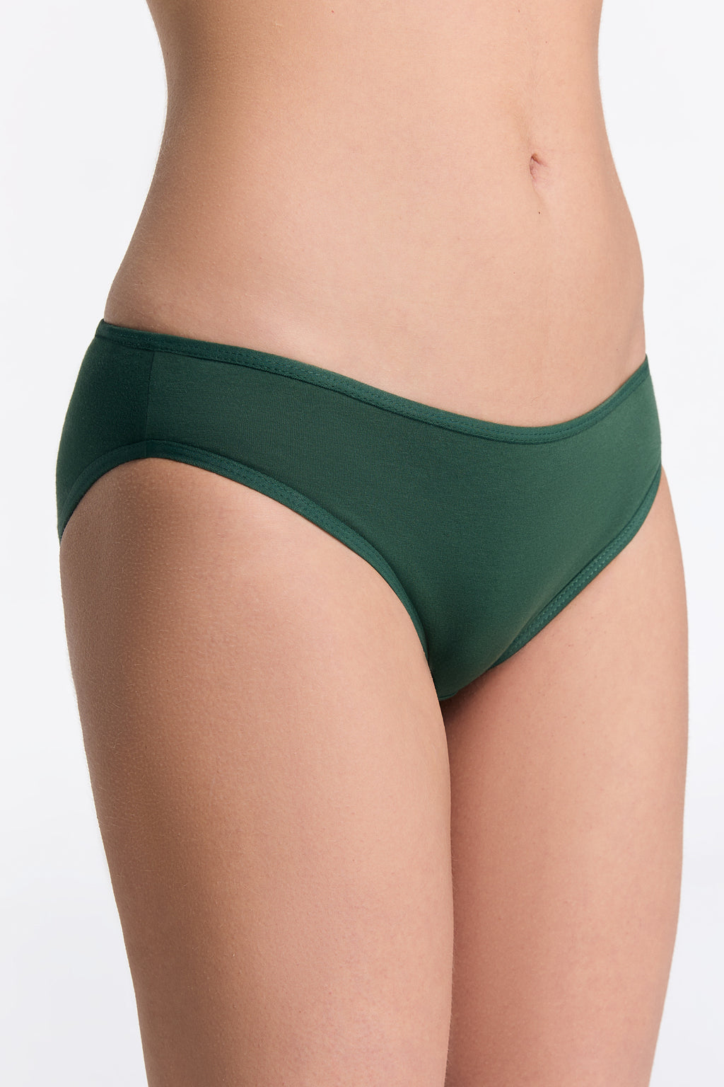 Women's classic organic cotton briefs in Dark Green, side view on model