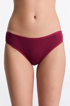 Women's classic organic cotton briefs in Rosarot, front view on model