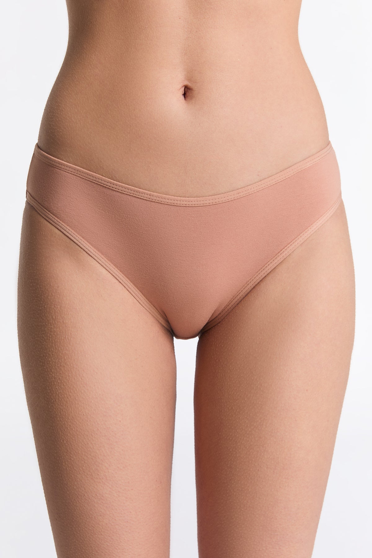 Women's classic organic cotton briefs in Café Crema, front view on model
