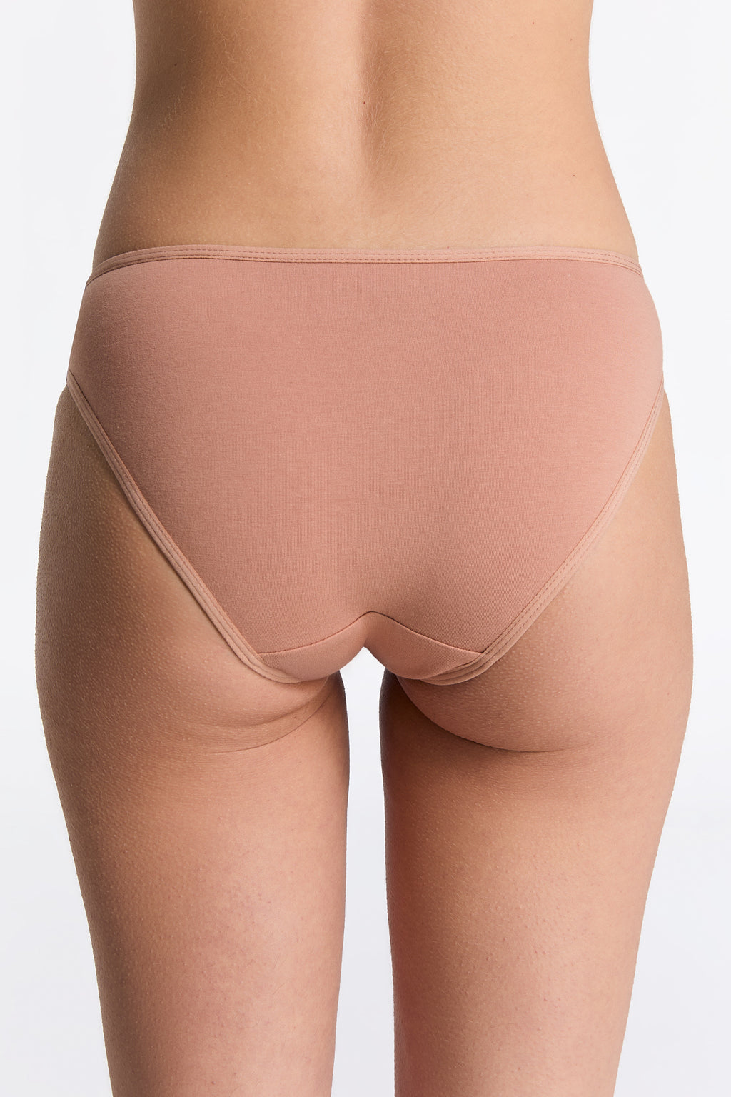 Women's classic organic cotton briefs in Café Crema, back view on model