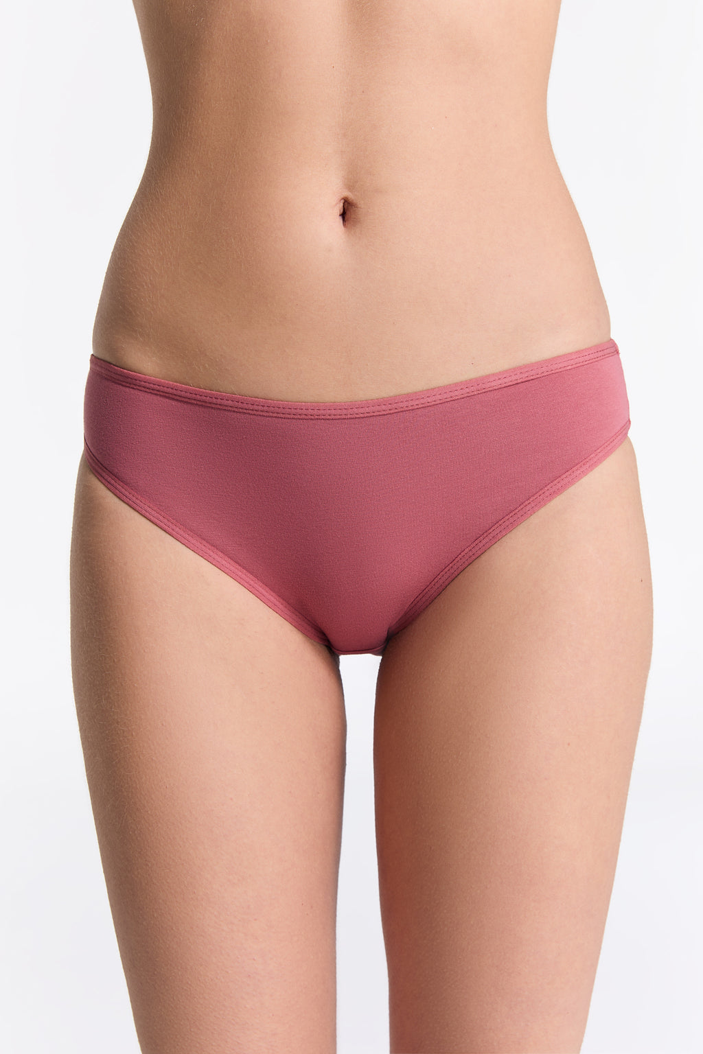 Women's classic organic cotton briefs in Faded Rose, front view on model