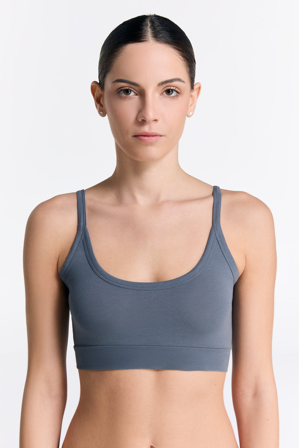 Women's organic cotton bralette in Dark Slate, front view on model