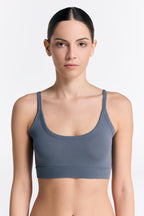 Women's organic cotton bralette in Dark Slate, front view on model