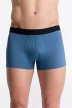 Men's organic cotton trunks in Alpine Grey, front view on model