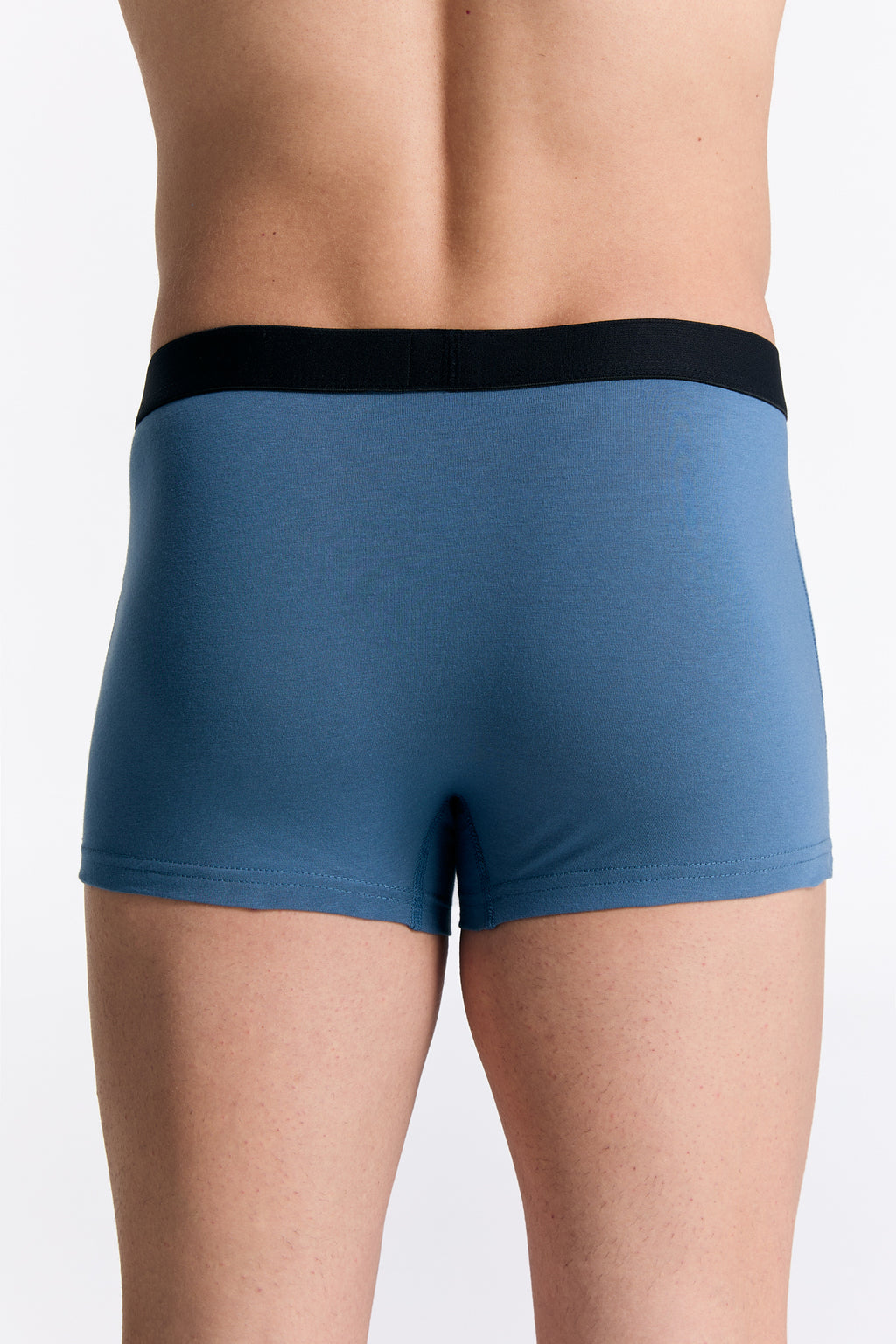 Men's organic cotton trunks in Alpine Grey, back view on model