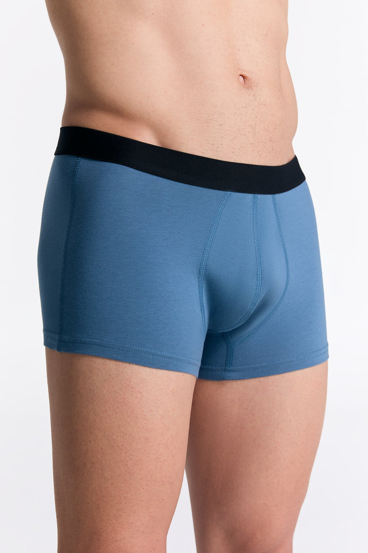 Men's organic cotton trunks in Alpine Grey, side view on model