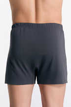 Men's organic cotton boxer shorts in Anthracite Melange, back view on model