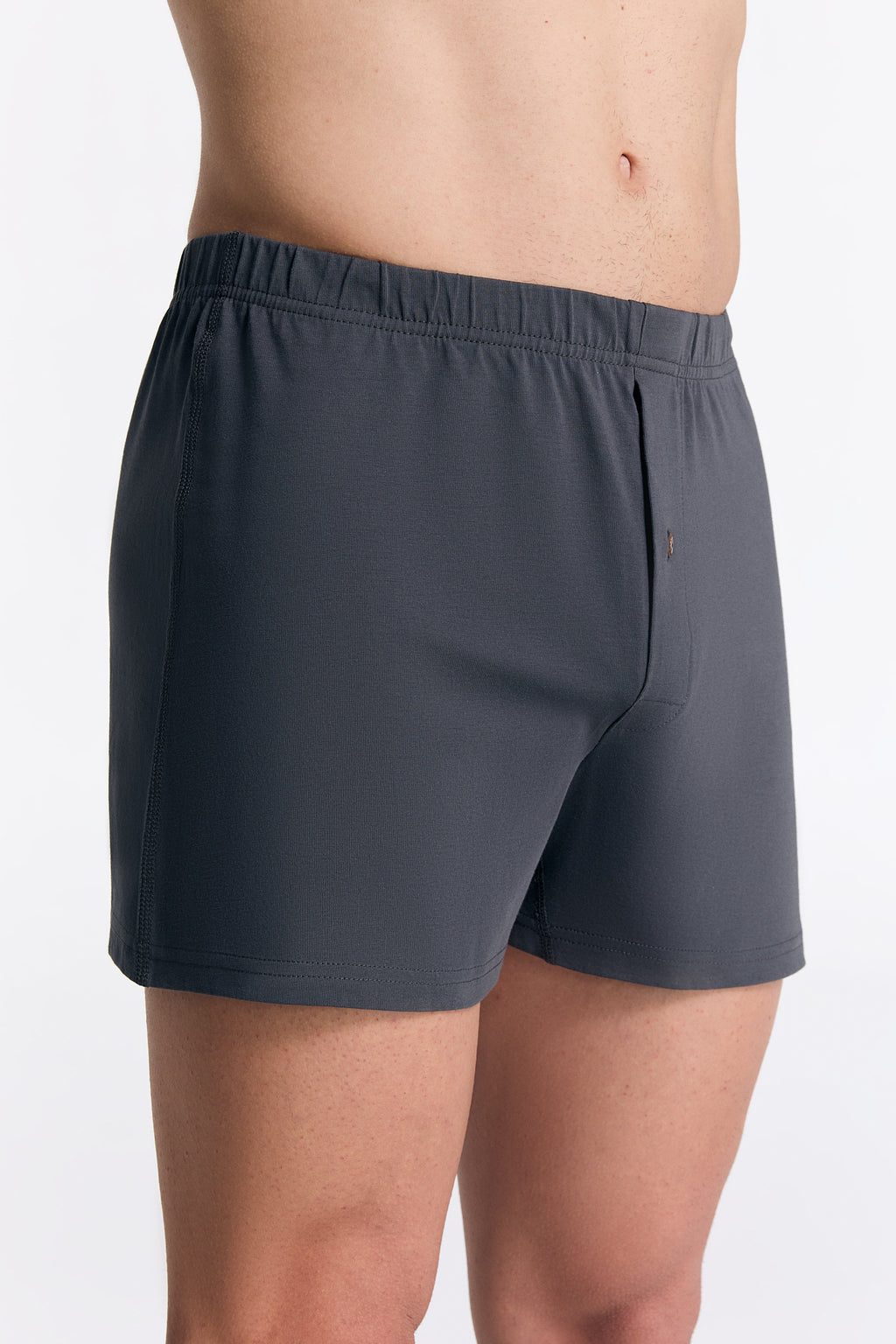 Men's organic cotton boxer shorts in Anthracite Melange, side view on model